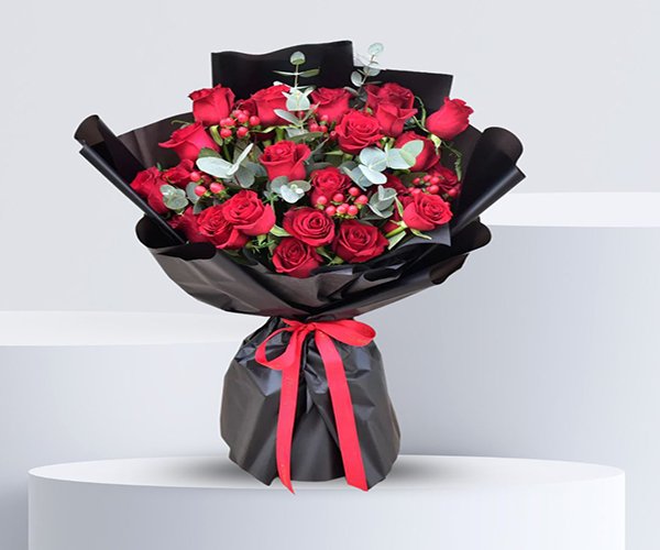 Red Roses in Black Bouquet